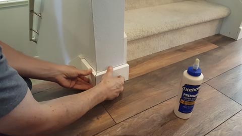 Fix trimmings with adhesive