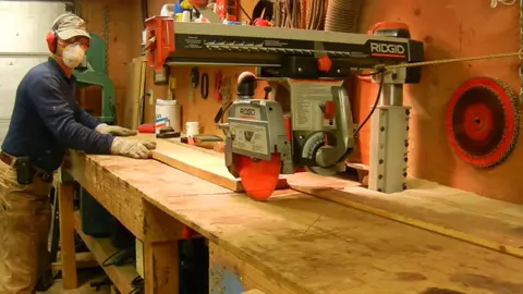 Axial glide system compound miter saw