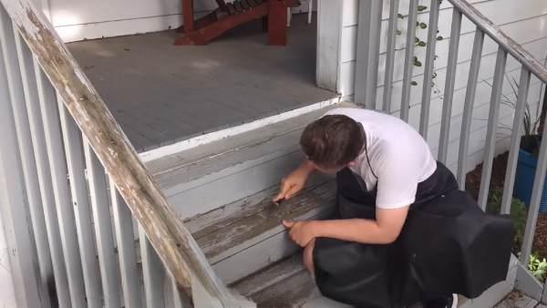 Can You Remove Old Dried Paint From the Wooden Porch Railings