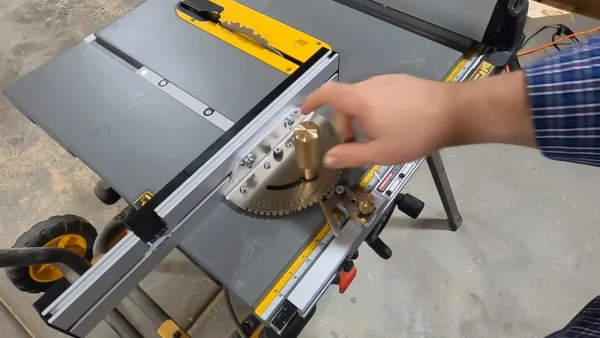 What is the Fundamental Purpose of the Miter Gauge When Used on the Table Saw
